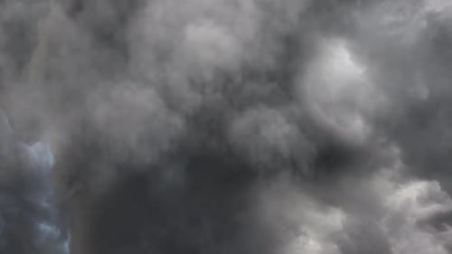 Dramatic Storm Clouds Time Lapse Against Gray Sky