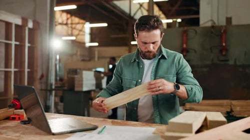 Carpentry, woodwork and man in factory on laptop for client orders, measure furniture