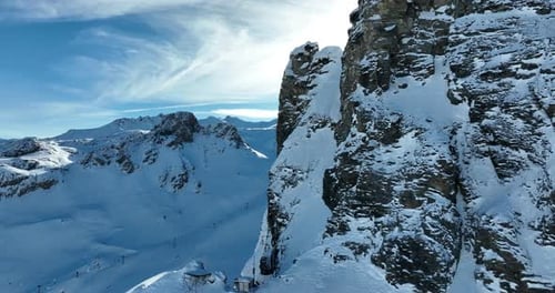 Majestic Snow-Covered Mountains on a Bright Winter Day