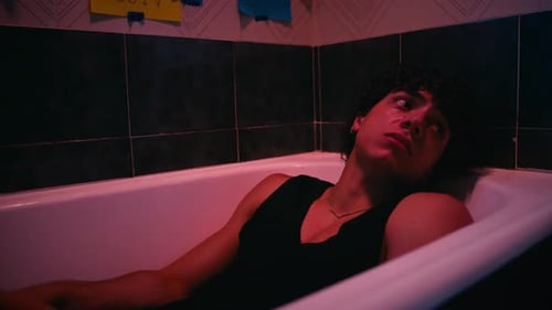 Young Man Almost Crying Inside The Empty Bathub