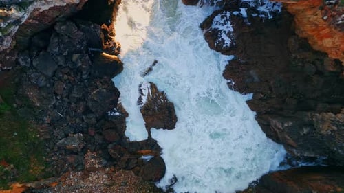 Powerful Stormy Sea Waves Crashing on Volcanic Seashore Aerial Ocean Splashing