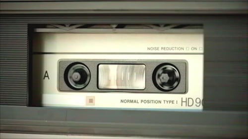 Audio Cassette Spinning Inside Cassette Player