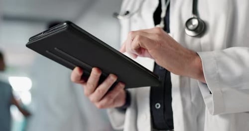 Doctor, hands and tablet for healthcare or medical information, online charts