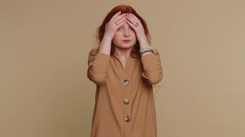 Adult Woman Touching Throat and Rubbing Temples