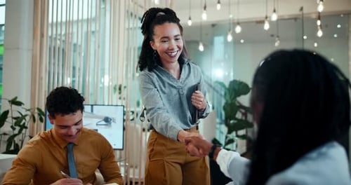Office, business people and woman with handshake for promotion, welcome and hello for meeting