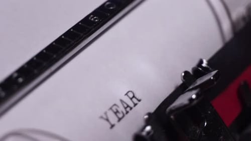 Year 1964, Typing in Vintage Typewriter on White Paper, Close Up
