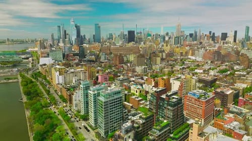 Sunny New York quarters with diverse architecture. Aerial view of metropolis with skyscrapers