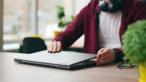 Tired Office Worker Finishes Work Takes a Break Closes Laptop Overworked Developer Ends Working Day