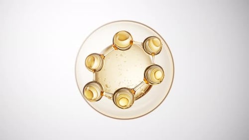 Animated 3D Molecular Structure Rotating in Fluid Drop