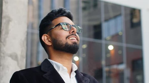 Happy Indian Business Man Enjoying Morning Coffee Hot Drink Relaxing Taking a Break in Downtown City