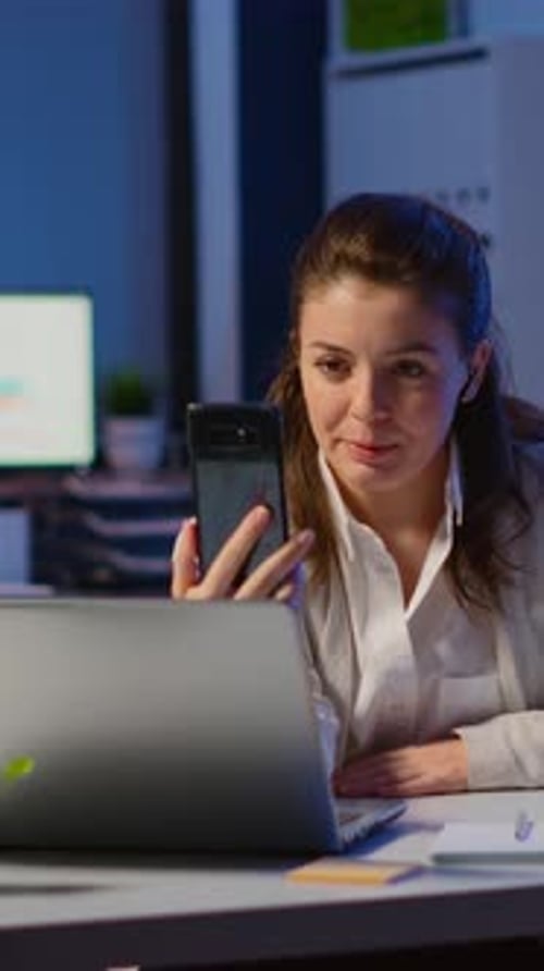 Vertical Video Business Woman Discussing During Video Conference with Partners Using Smartphone