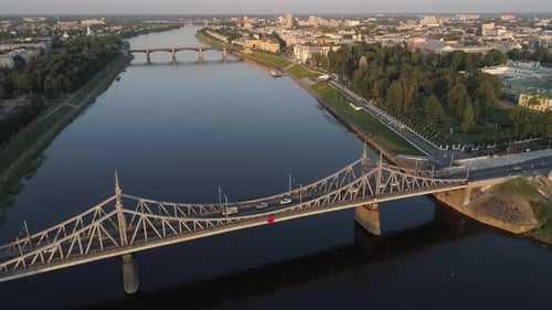 Aerial View of the Road Bridge Across the River at Sunset Beautiful Cityscape