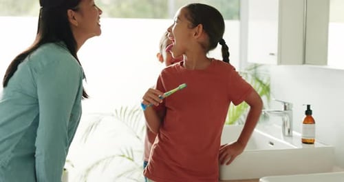 Mother, learning or children in bathroom brushing teeth together for development in morning