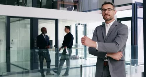 Management, leadership and a business man arms crossed in the office of a corporate company looking