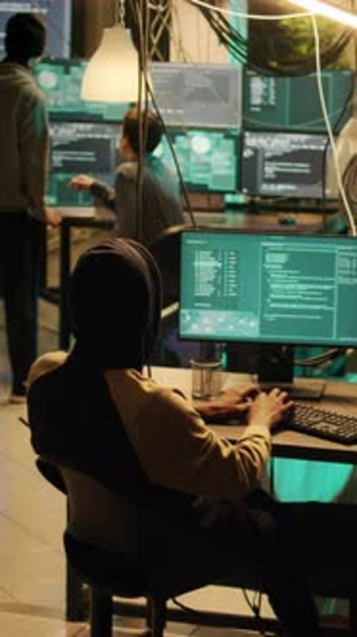 Vertical Video Young Cyber Criminal Breaking Computer Firewall to Plant Malware