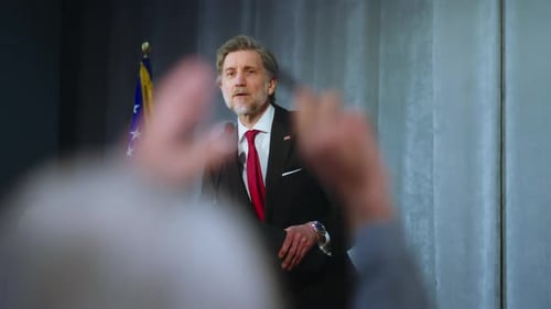 Man Giving Formal Speech at White House Podium