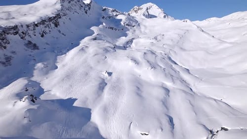 pushing in over dreamy alpine winter landscape in the swiss alps