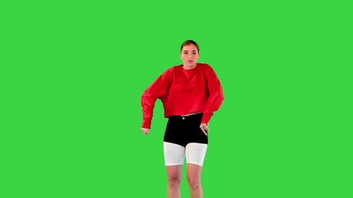 Enthusiastic Female Dancer Performs Some Contemporary Dance Movements on a Green Screen Chroma Key