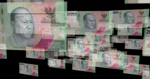 Indonesia Rupiah 20000 banknote – flying between transparent money