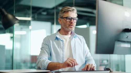 Mature Employee job done Satisfied office worker leaning back businessman relaxing after hard work