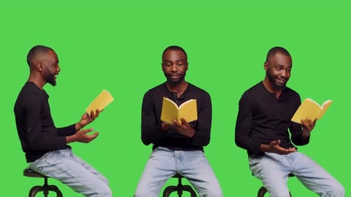 Male Person Holding Book to Read Tale in Studio