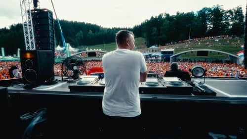 DJ's Dynamic Live Mixing In An Outdoor Concert