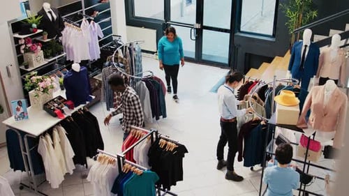 Customers Shopping for Clothing in a Fashion Store