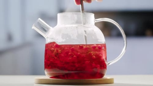 Frozen Cranberries Cooking for Tea or Jam Background Close Up of Cranberry Berries in on the Kitchen
