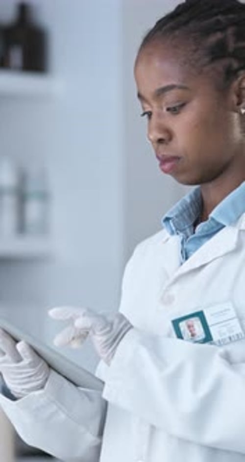 Tablet, science and vaccine with black woman in laboratory for medical, healthcare
