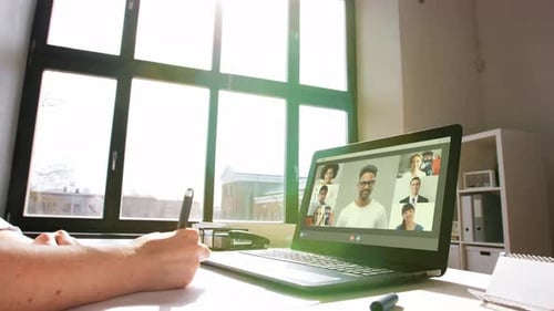 Remote Job, Technology and People Concept - Young Businesswoman with Laptop Computer