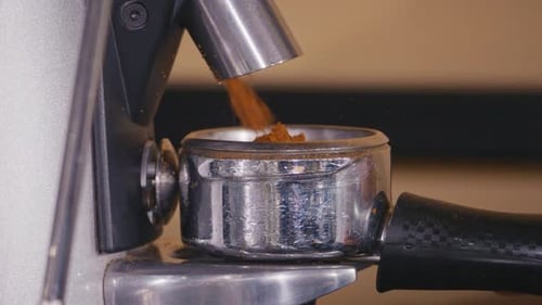 Coffee Grinder Dispensing Fresh Grounds