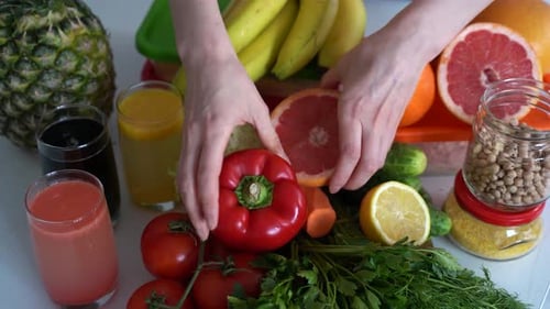 Colorful Fruits and Vegetables with Juices Still Life