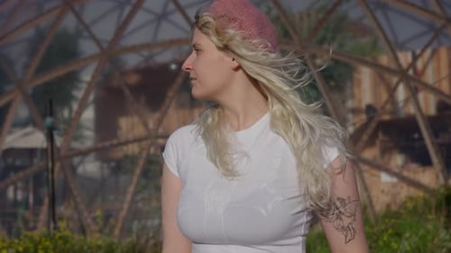 Woman with Blonde Hair Wearing Beret near Dome