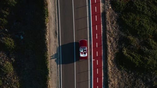 Drone Shot of Convertible Vintage Red Car on Road