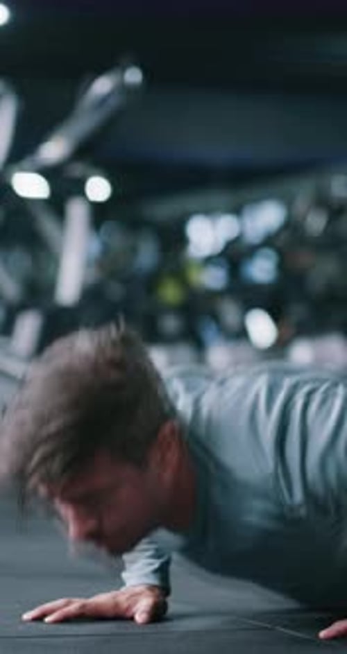 Fitness, push up or man in gym with routine, workout or cardio strength in endurance training