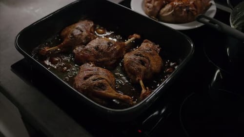 Cooked Duck Legs and Baked Sweet Potatoes