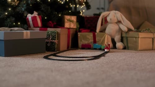 Toy Train Near Christmas Tree