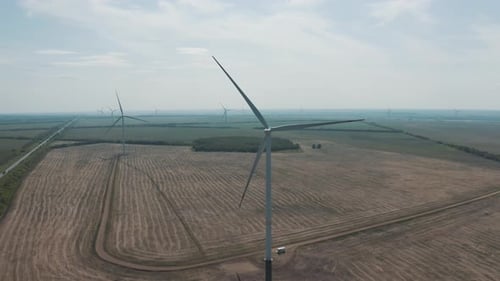 Wind Turbines Spinning on Rural Farmland, Aerial View