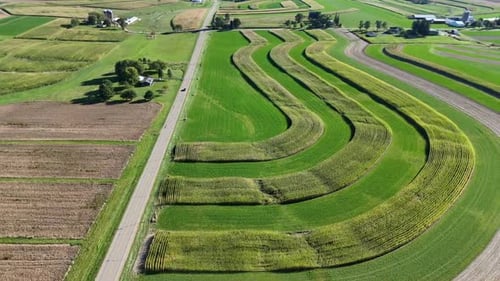 Contour Farming is a practice that involves performing farming across a field's slope. This includes