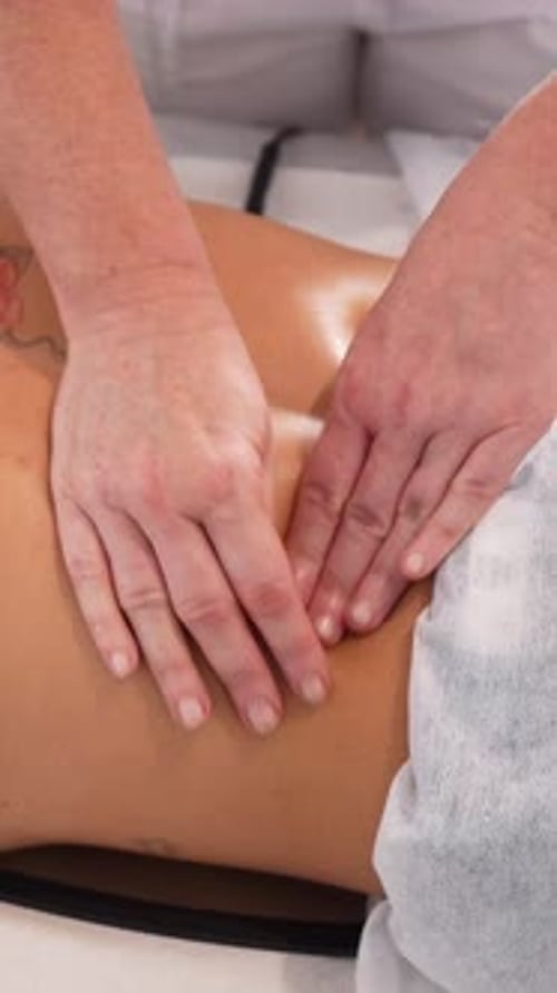 Close-Up of Woman Receiving Relaxing Back Massage