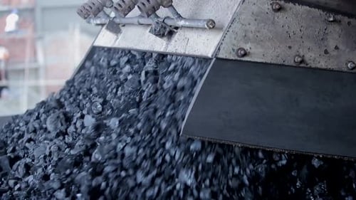 coal factory duping industrial raw material on train