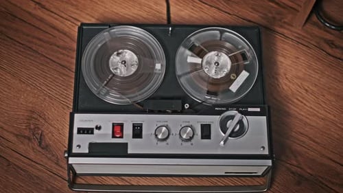 Reel-to-Reel Tape Recorder Playing Audio