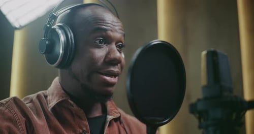 Voice Actor Recording Emotional Dubbing Lines In Studio