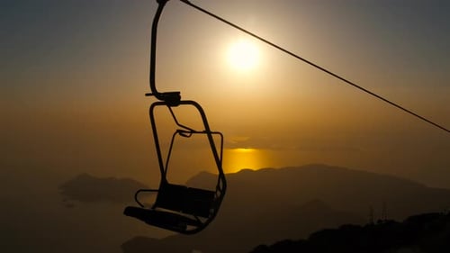 Cable Cars on Way Against Evening Sky