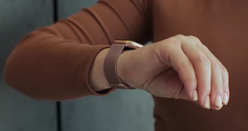 Woman Fingers Does Double Tap on Smart Watch for Handsfree Interaction Woman Using Smartwatch