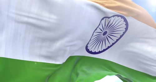 Realistic Waving Indian Flag on Bright Blue Sky