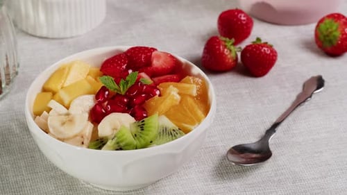 Colorful Fruit Bowl with Sliced Fresh Fruit