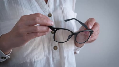 Lady Hands Hold Modern Eyewear