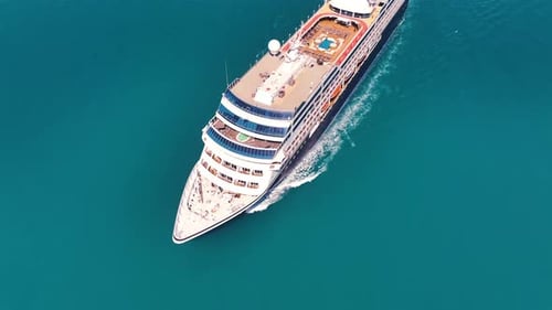 Cruise ship sailing across The Mediterranean sea - Aerial footage.