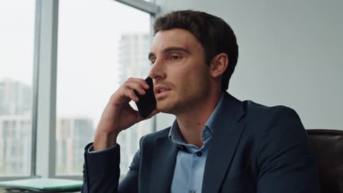 Closeup Focused Employee Talking Cellphone In Office. Confident Manager Working Computer Consult ...